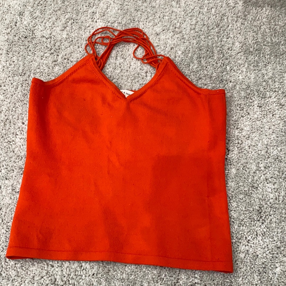 Super sexy knit top. Short so it’s meant to show midriff or wear w/high waist